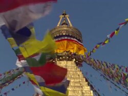 MS ZO View of prayer flags on spire of Boudhanath Stupa / Kathmandu, Central, Nepal Stock Footage