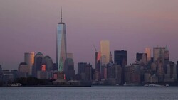 Statue of Liberty, One World Trade Center and Downtown Manhattan across the Hudson River, New York, Manhattan, United States of America Stock Footage