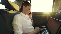 Client - partner phone call conversation in the car. Stock Footage