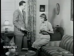 1948: MARRIAGE MONEY ARGUMENT: DRAMATIZATION: Husband SOT asking wife what bill is, they can't afford freezer, wife saying he can afford to buy drinks for 'cronies', he saying in insurance, good business, she saying freezer good business for her. Instructional Video