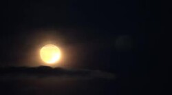 Full Moon behind Clouds Stock Footage