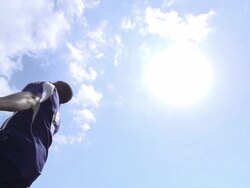A man playing soccer on a grassy field. - Slow Motion - filmed at 240 fps Stock Footage
