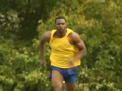 Male Athlete Runs Toward Camera Stock Footage