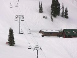 Winter Landscape with Ski Lift and Cabin Stock Footage