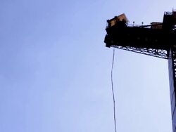 MS SLO MO Shot of Man Bungee Jumping at Namyangju / Gyeonggi=do, South Korea  Stock Footage