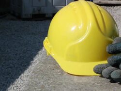 Yellow hard hat and gloves Stock Footage