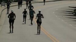 Athletes Long distance field running race Stock Footage