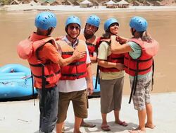 Five senior people ready for white water rafting, Ganges River, Rishikesh, Uttarakhand, India Stock Footage