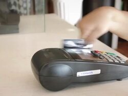Women Swiping A Credit Card,Dolly Shot Stock Footage