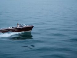 Couple driving on yacht Stock Footage