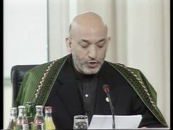 Adds Karzai's closing comments to conference package News Clip