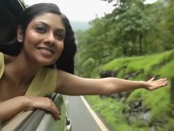 Young woman watching from window of a car, Malshej Ghat, Maharashtra, India Stock Footage