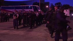 CLEAN : Protesters and police gather in front of court for hearing News Clip