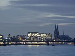 WS T/L View of cologne skyline and Rhine river at dusk / Cologne, North Rhine-Westphalia, Germany Stock Footage