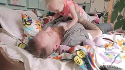 Father playfully lifting daughter overhead Stock Footage