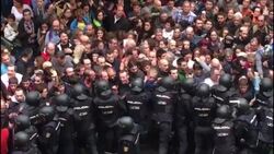 Police hold back crowd at Ramon Llull school Instructional Video