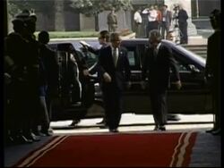 Arrivals, Lagos welcomes leaders, poncho photo op News Clip