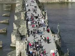 MS People walking on charles bridge over vltava river / Prague, Hlavni mesto Praha, Czech Republic Stock Footage