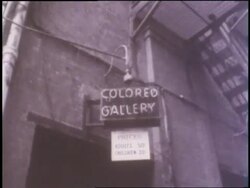 African Americans walk on a city street. News Clip