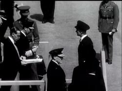 KING HOLDS OPEN-AIR INVESTITURE - News Clip