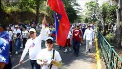 CLEAN : Venezuelans protest en masse in rival rall News Clip