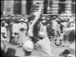 B/W 1930s PAN police beating demonstrators with flags in anti-British protest / New Delhi, India Stock Footage