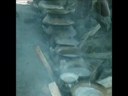 SYND 7 11 74 PEOPLE QUEUEING FOR FOOD AT A FAMINE RELIEF CAMP IN RANGPUR News Clip