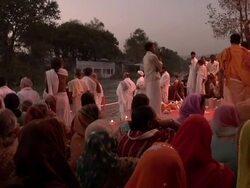 People at ritual by the river Stock Footage
