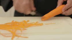 Peeling carrots Stock Footage