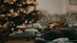 Decorated dinner table for christmas eve Stock Footage