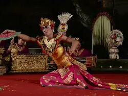 MS Balinese dancer is performing Kebyar Terompong Dance in front of Gamelan orchestra in Puri Saraswati temple AUDIO / Ubud, Bali, Indonesia, Asia Stock Footage