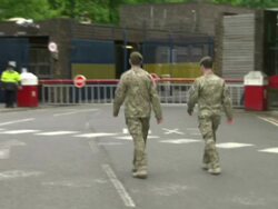 Army soldiers entering Woolwich Barracks News Clip