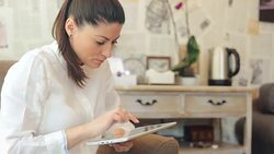 Woman using a digital tablet. Stock Footage