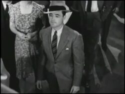 Excited people walking toward an unseen attraction Stock Footage