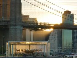 Brooklyn Bridge and Manhattan skyline at sunset. Stock Footage