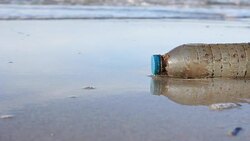 HD:Environmental Pollution, plastic bottle on the beach. Stock Footage