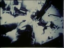 Two Apollo 7 astronauts talk during the first American telecast from the space capsule in outer space in October, 1968. News Clip