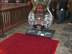 ATMOSPHERE: Guitar at the Ozzy Osbourne Signs a 10-Foot Guitar at The House Of Blues at Hollywood CA. (Footage by WireImage Video/GettyImages) Stock Footage