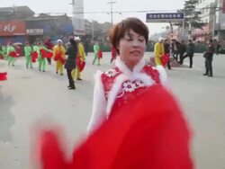 MS TS Villagers performing yangko dance in traditional festive folk celebration or carnival during chinese spring festival  AUDIO  / xi'an, shaanxi, china Stock Footage