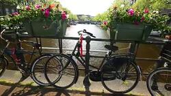 Amsterdam canal with bicycles Stock Footage