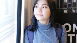 Woman use social media for communication in the sky train Stock Footage