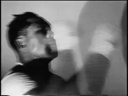 B/W 1956 close up Archie Moore punching speed bag in training in gym / newsreel Stock Footage