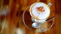Coffee on the wood texture table at coffee cafe Stock Footage