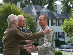 MS ZI Father and Granfather in Uniform Greeting Soldier Son Returning Home from Military Service / Richmond, Virginia, United States Stock Footage