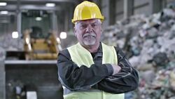 SLO MO portrait of a recycling facility worker Stock Footage