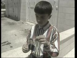 Video of bombing suspect, funeral of victim News Clip