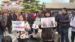 CLEAN : Among the believers: hope endures for MH370 relatives News Clip