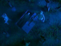 HD CRANE: Zombies Rising From The Graves Stock Footage