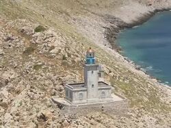 MS AERIAL coast of Peloponnese, lighthouse / Mani, Peloponnese, Greece Stock Footage