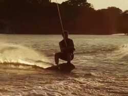 USA, Florida, Orlando, Maitland Lake, Man wakeboarding Stock Footage
